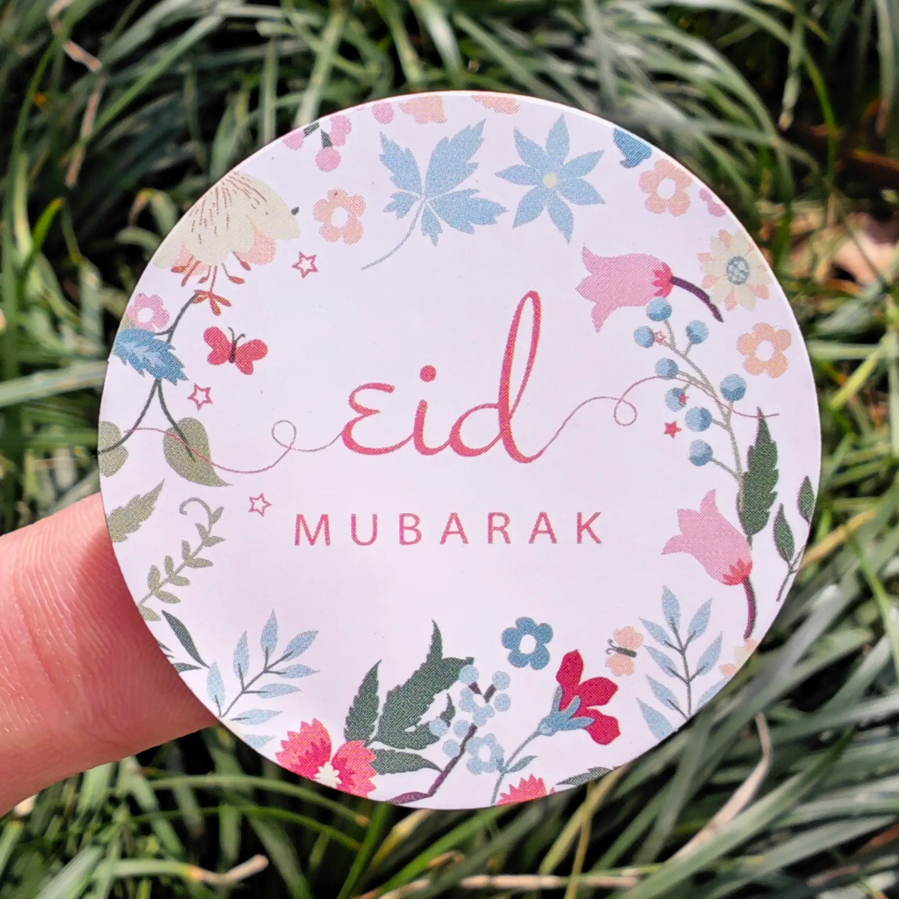 Floral Eid mubarak stickers pink blue teal red green grass background Eid City Canada